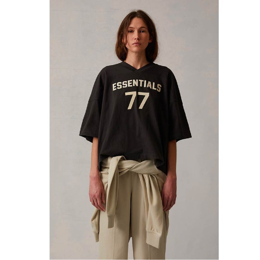 FOG - FEAR OF GOD Essentials Women's Iron Football T-Shirt.